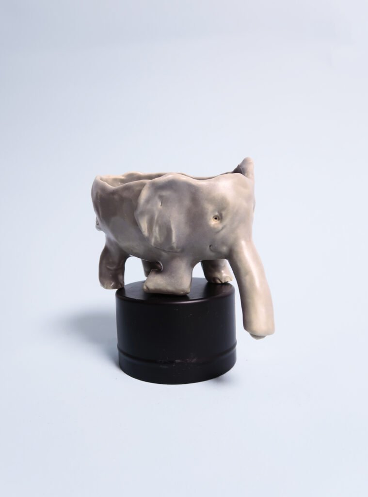 photo of a ceramic elephant self-draining soap dish