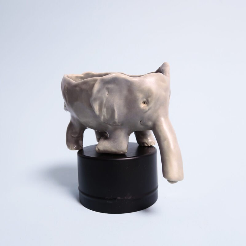 photo of a ceramic elephant self-draining soap dish