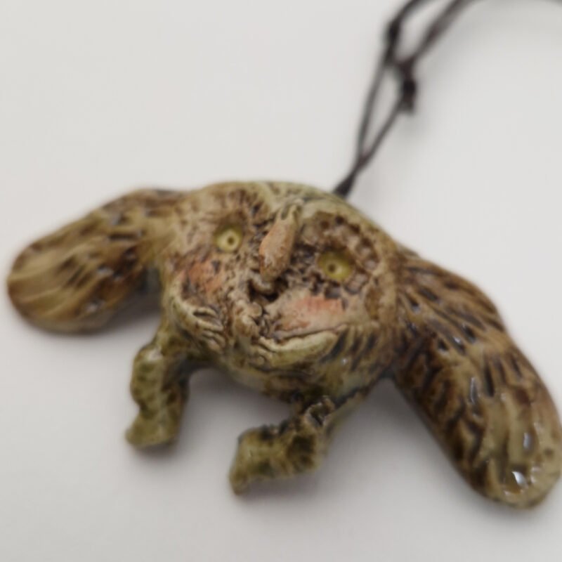 ceramic brooch/pendant of a creature