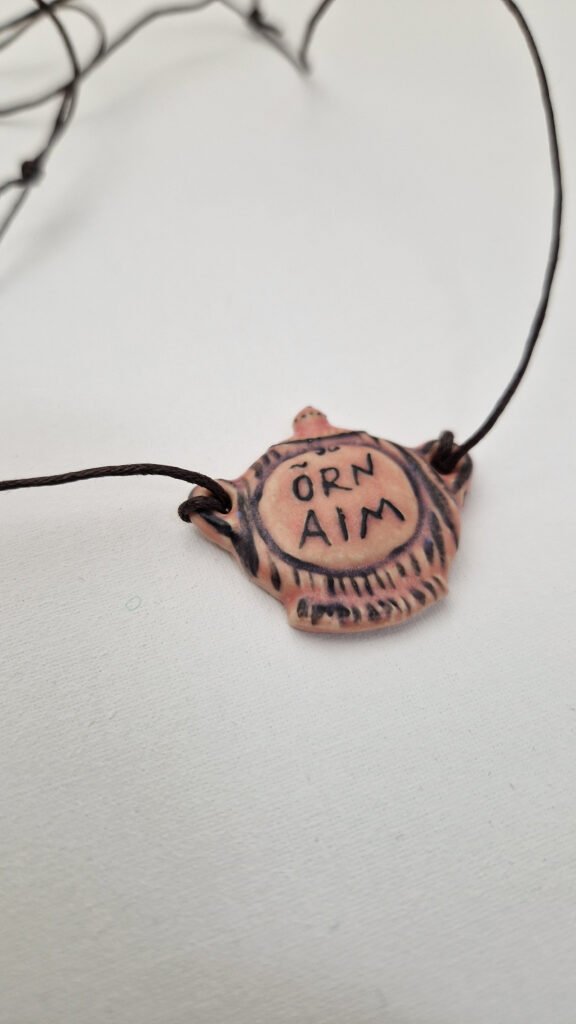 ceramic pendant in the shape of a sugar bowl