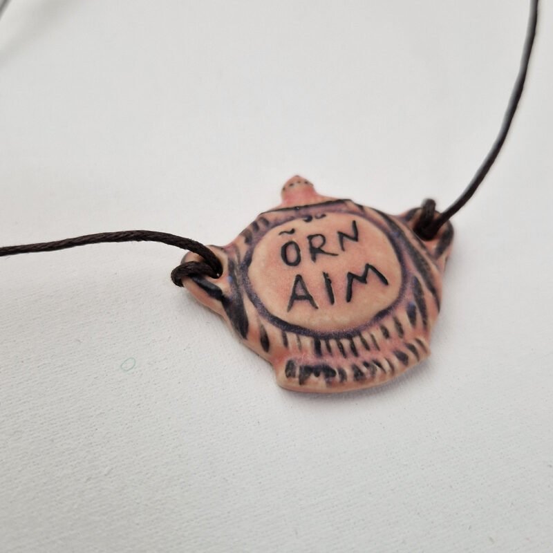 ceramic pendant in the shape of a sugar bowl