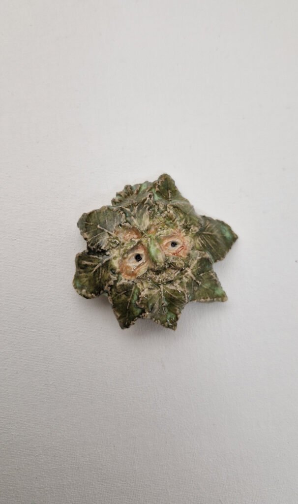 ceramic green man brooch