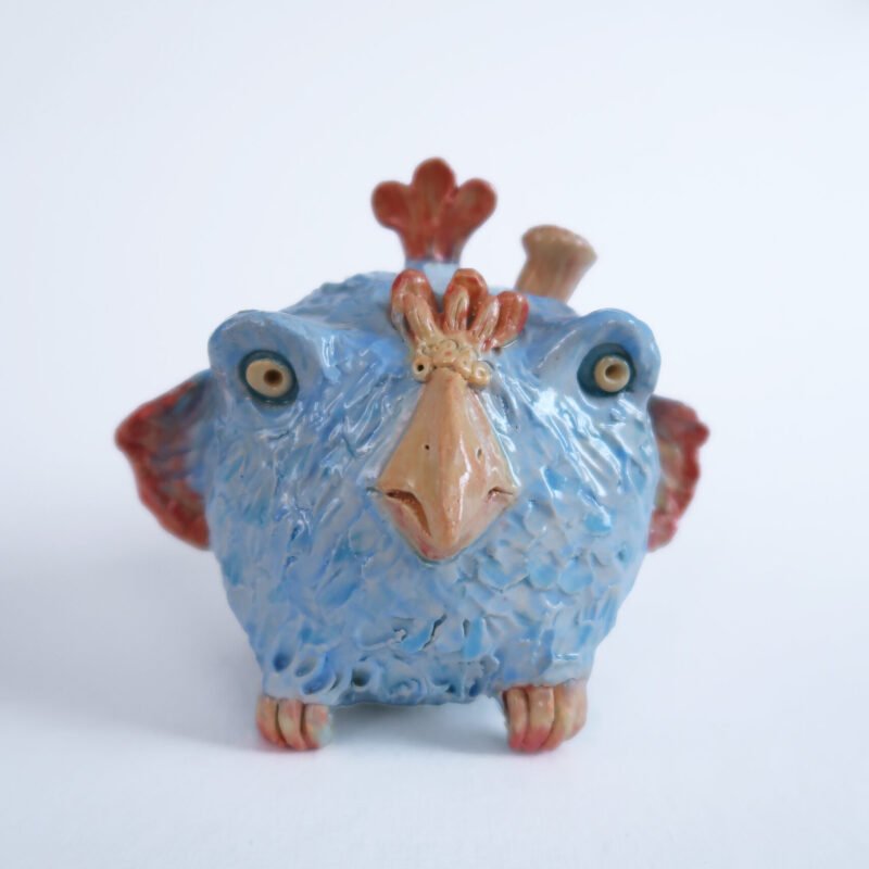 photo of a mythical ceramic bird-creature