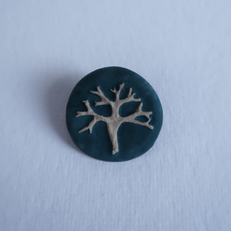 ceramic brooch with a lichen