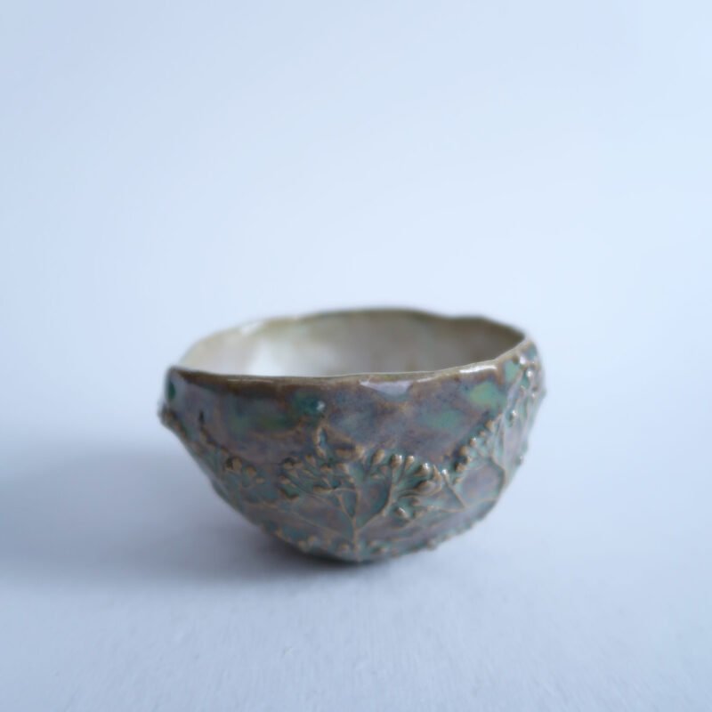 small ceramic salt cellar with the relief of rowan tree buds